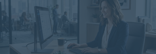 woman in suit working at her desk